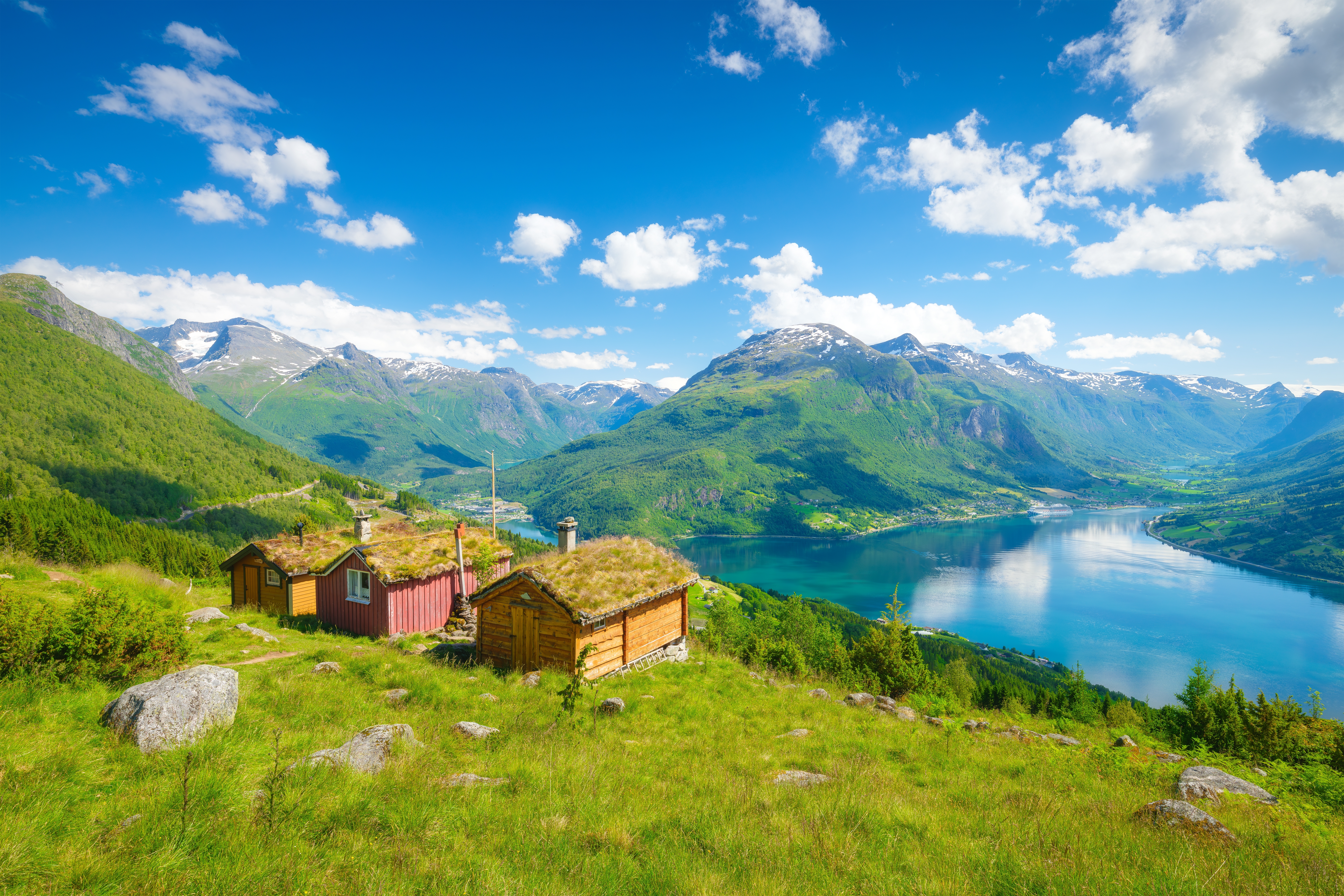 Traditional houses on a hill, overlooking dramatic fjords in Rakssetra, Norway