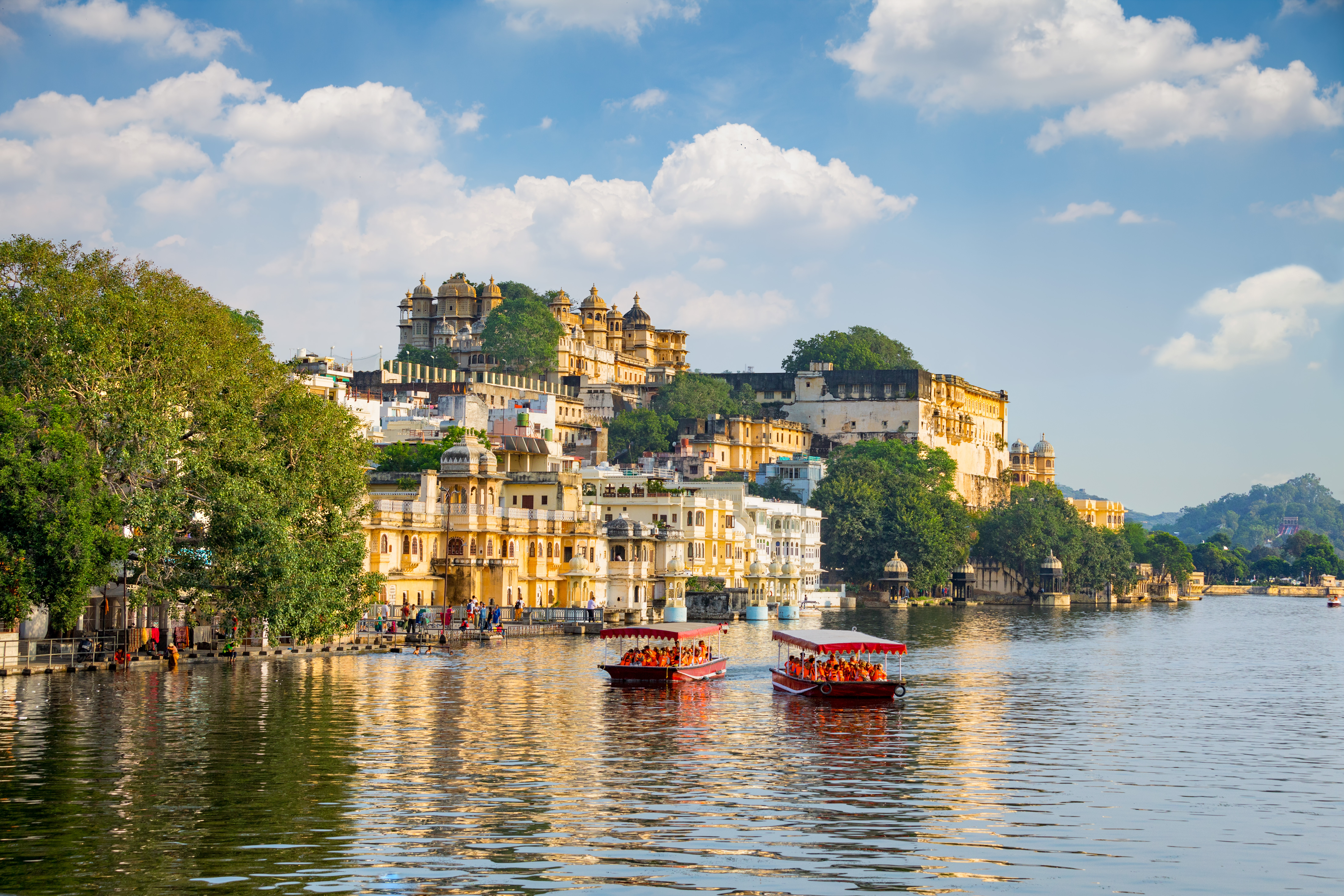 River backed by City Palace in Udaipur, India