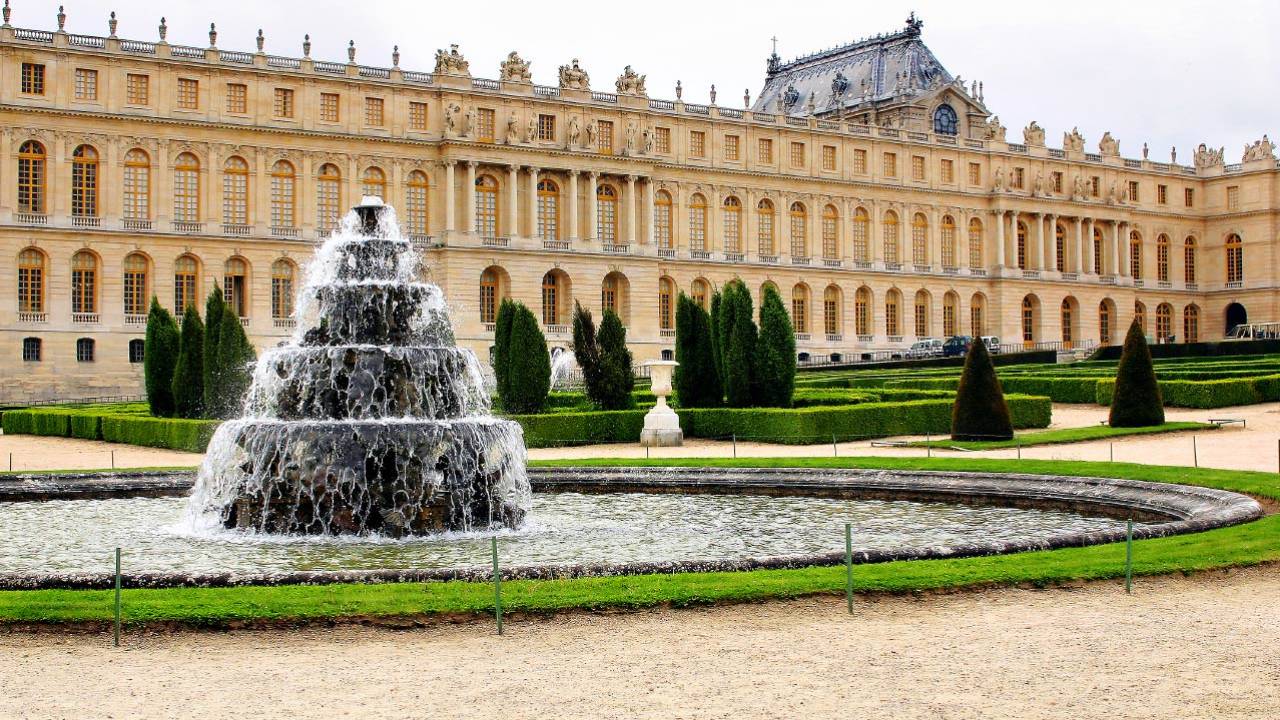 Fountain with water in castle chateau Versailles