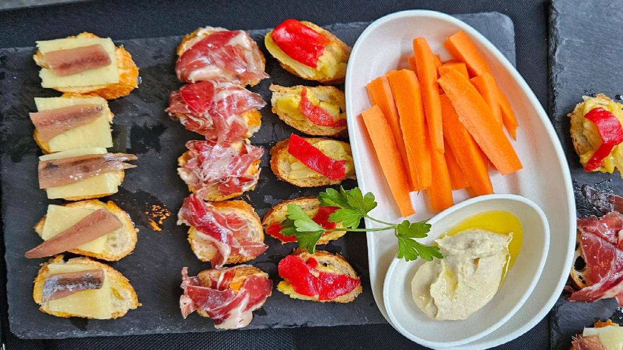 Spanish Tapas and Premium Open Bar with Sailing Experience Barcelona